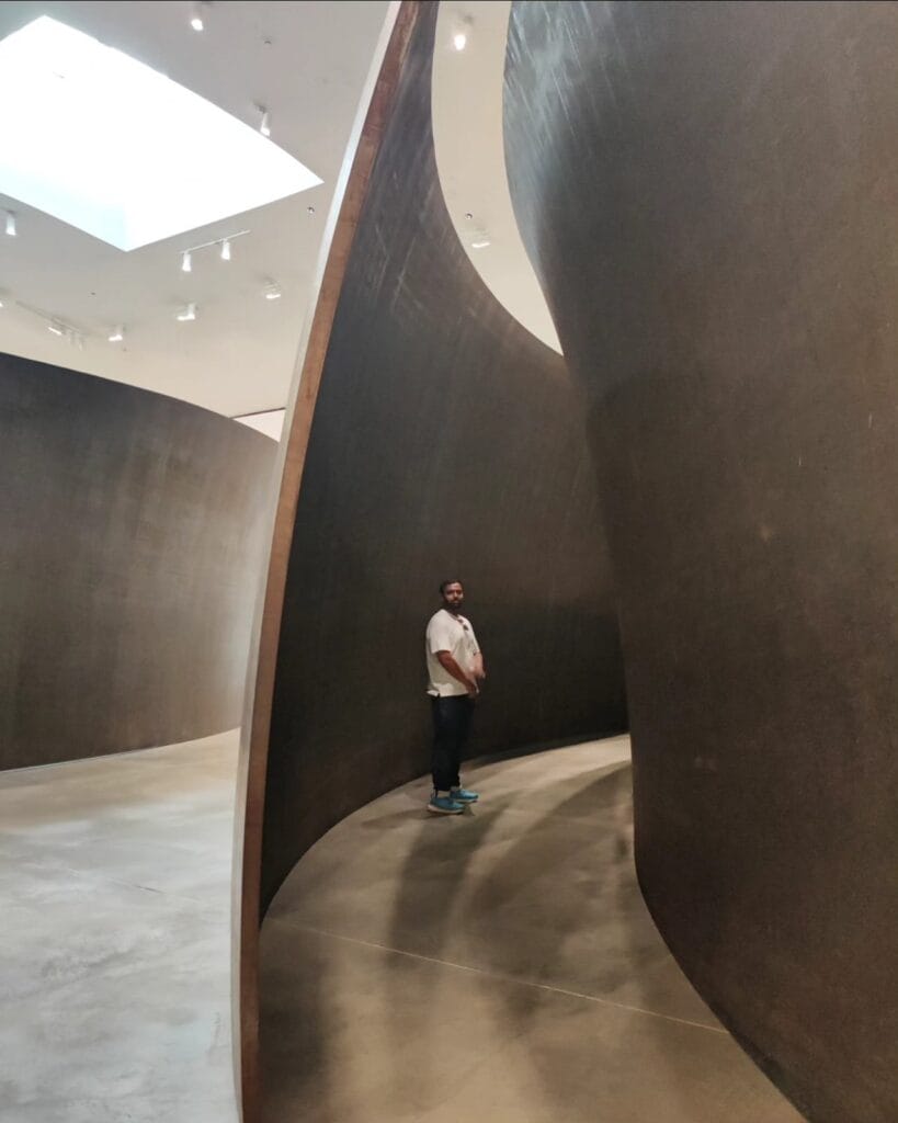 Richard Serra's weathered steel maze sculpture inside the Guggenheim Bilbao