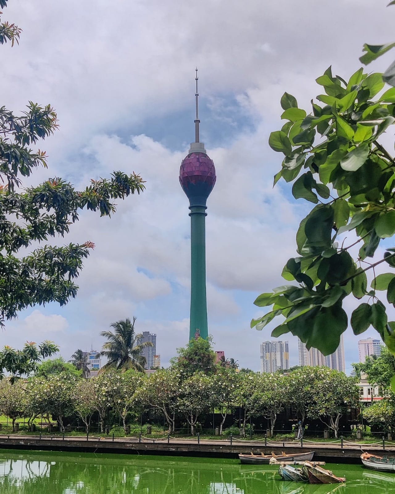The Lotus Tower rising over Beira Lake and greenery in Colombo