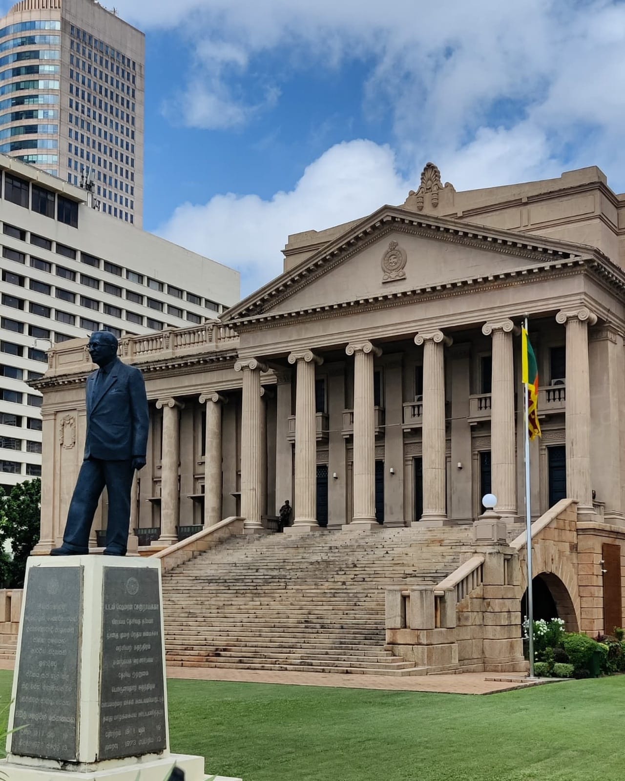 The colonial Old Parliament Building with its statue in Colombo