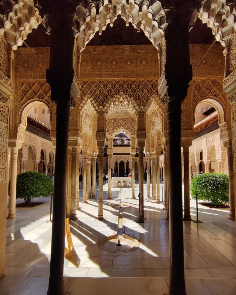 Forest of carved columns in the Court of the Lions arcade, Alhambra, Granada