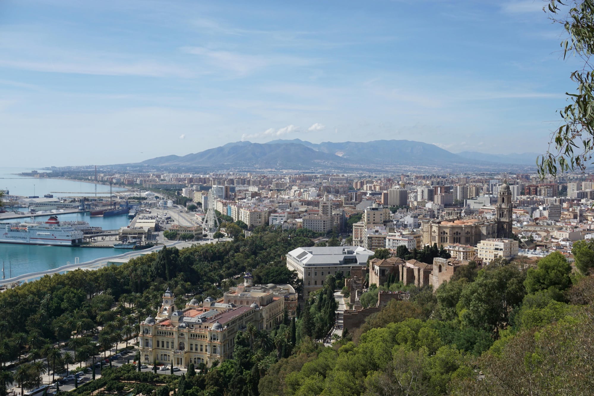 Aerial view of Malaga, its port and the mountains beyond