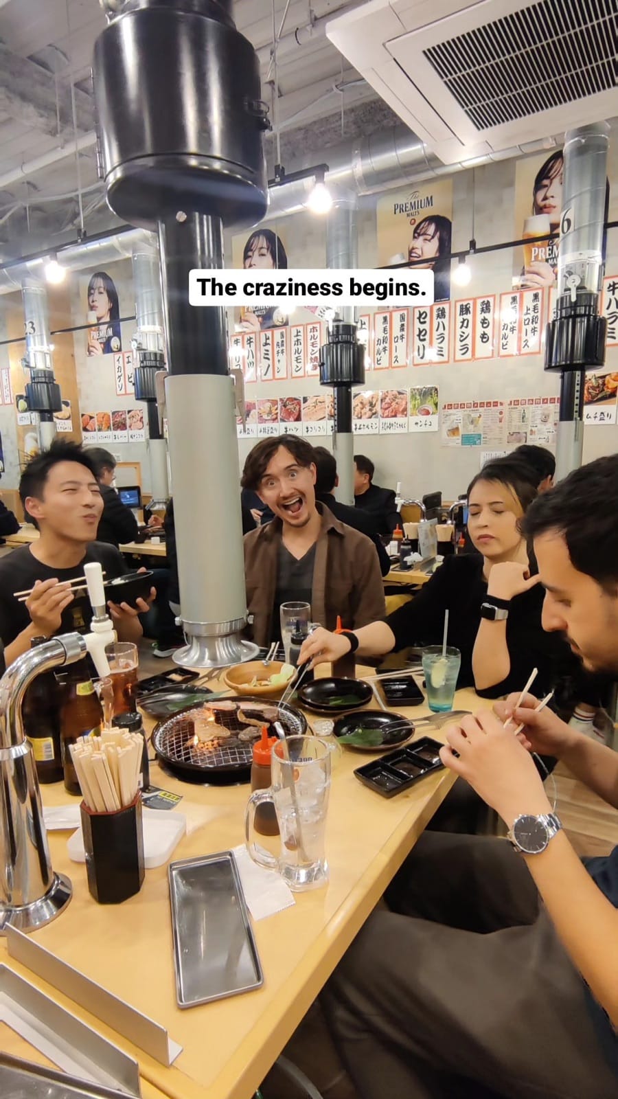 Korean BBQ restaurant with grill setup.