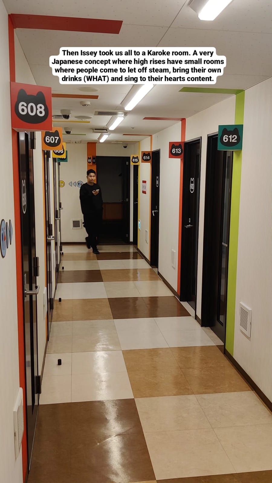 Karaoke room hallway with numbered doors.