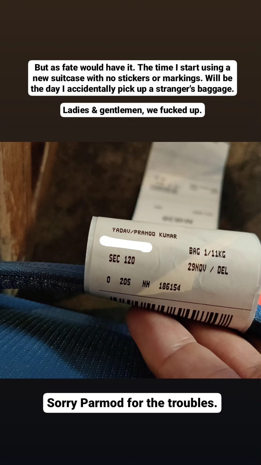 ANA baggage tag with a stranger's name on an identical blue suitcase after a luggage mix-up at Haneda Airport