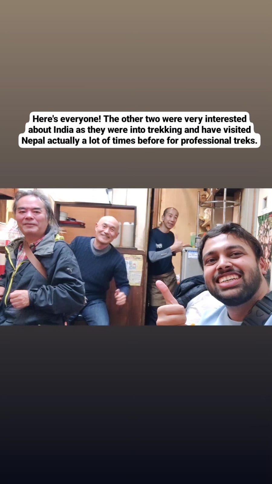 Group selfie with the ramen chef and two Japanese regulars inside a tiny Musashi-Koyama ramen shop