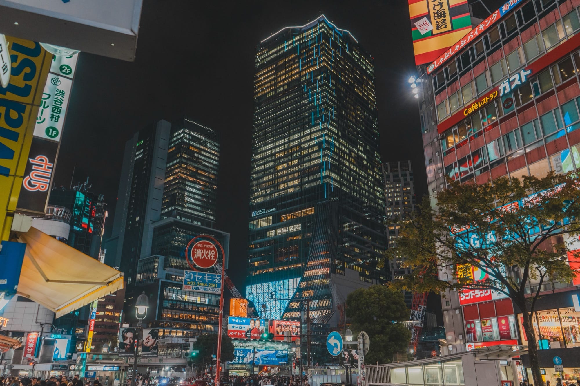 Neon signs and crowded streets of Kabukicho in Shinjuku, Tokyo at night
