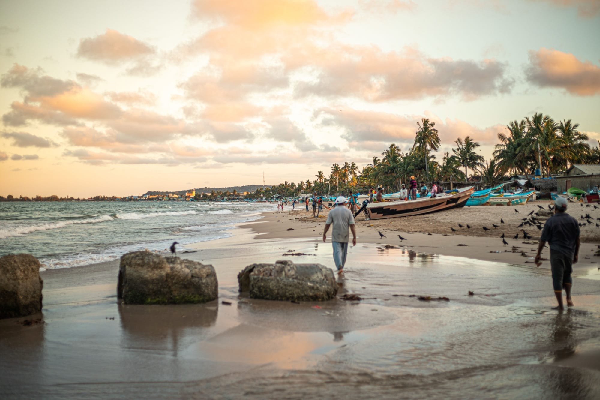Wide view of a quiet golden beach near Trincomalee on Sri Lanka's east coast