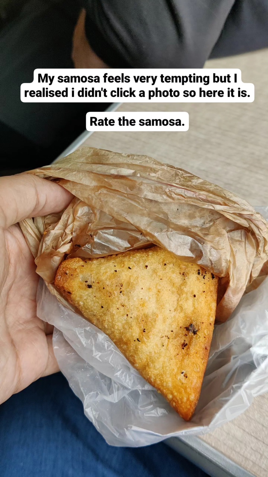 A train samosa in paper from a vendor on the Ella train