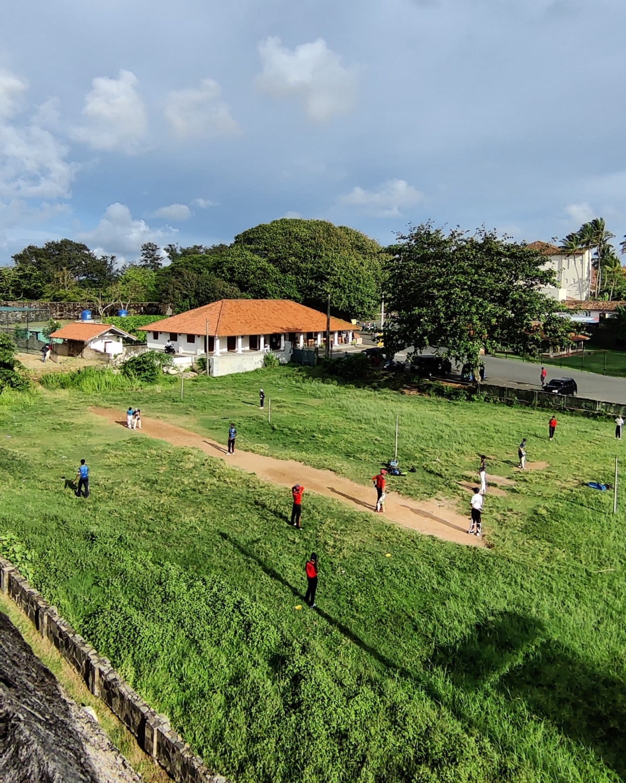 Cricket practice on the green below the Galle Fort ramparts