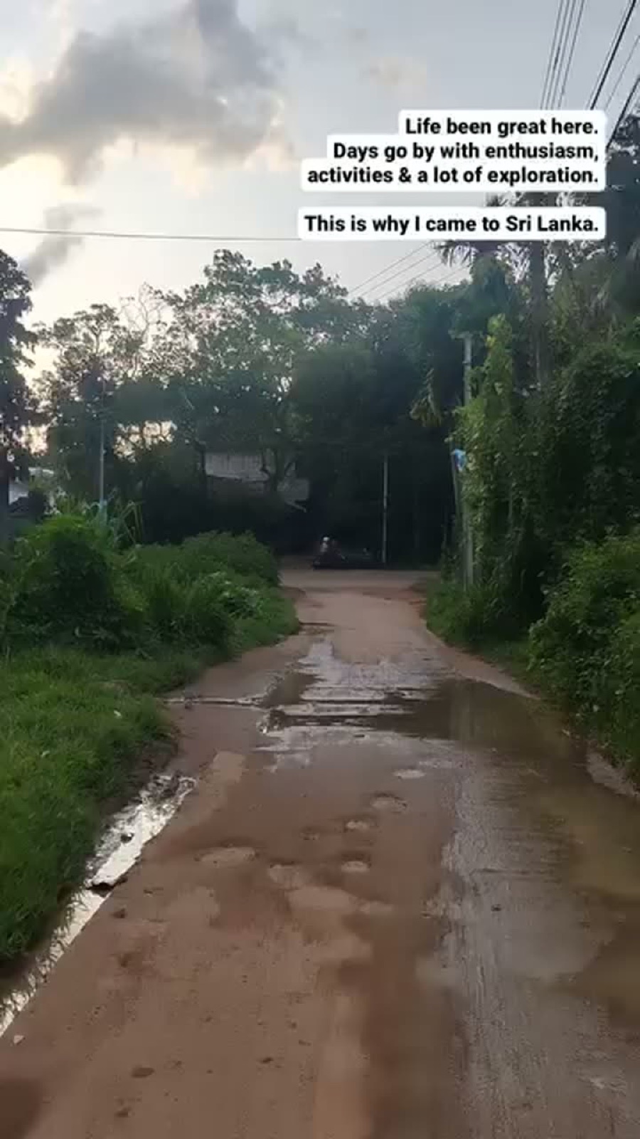 Story frame of a wet village lane: life's been great, this is why I came to Sri Lanka