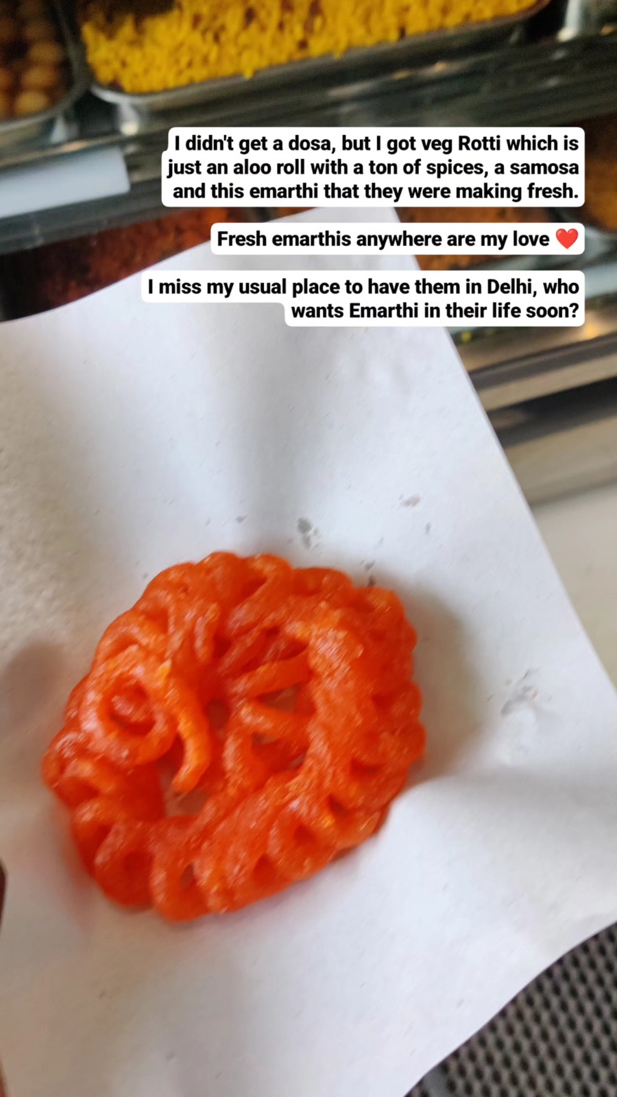 A fresh orange emarthi sweet from a Nuwara Eliya counter