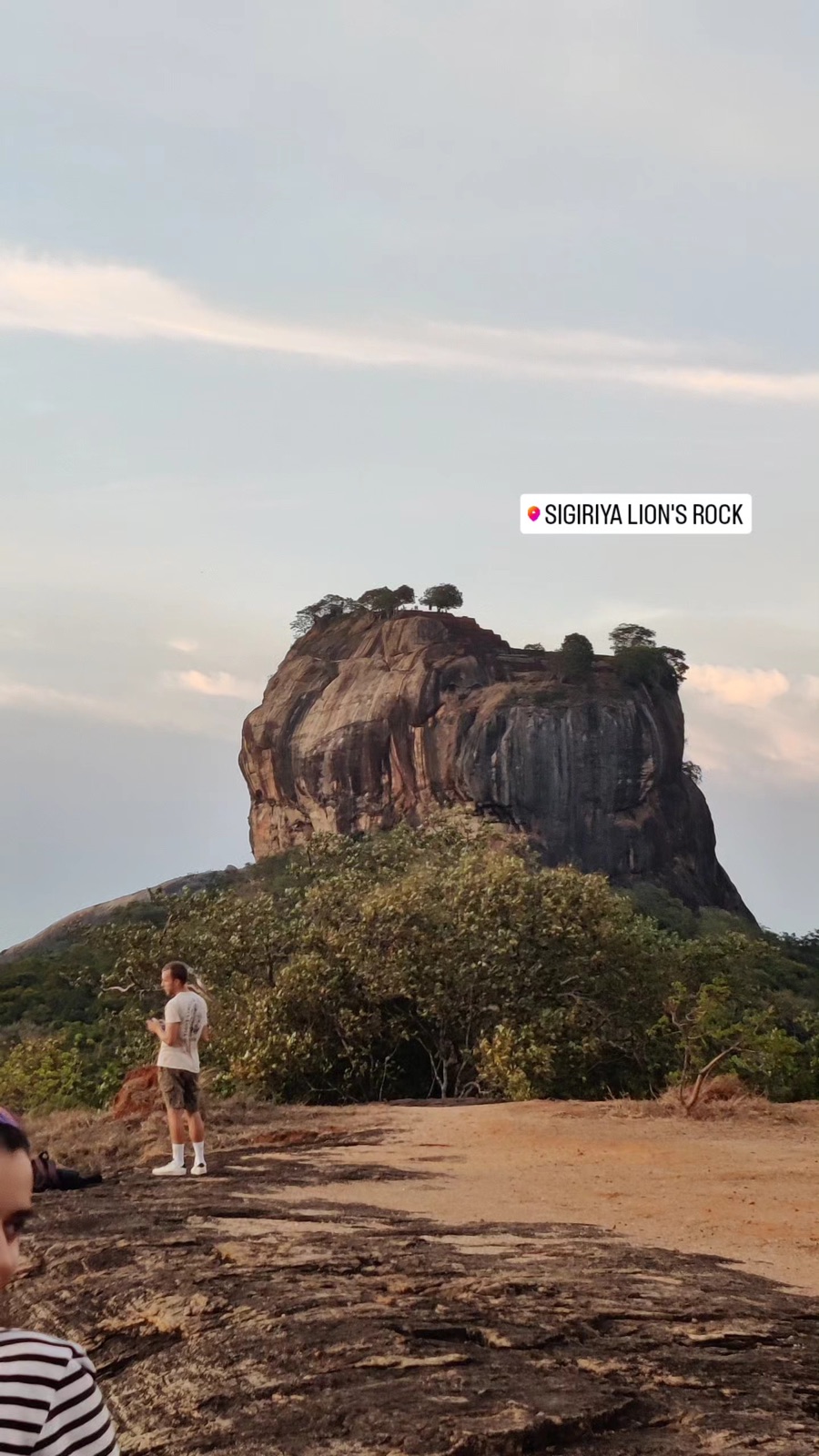 Lion's Rock in Sigiriya seen from a smaller rock across the jungle